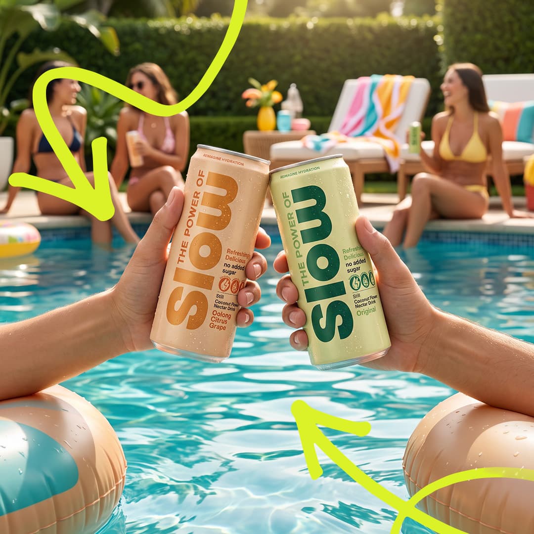 SLOW Original and SLOW Oolong Citrus Grape cans held above a swimming pool